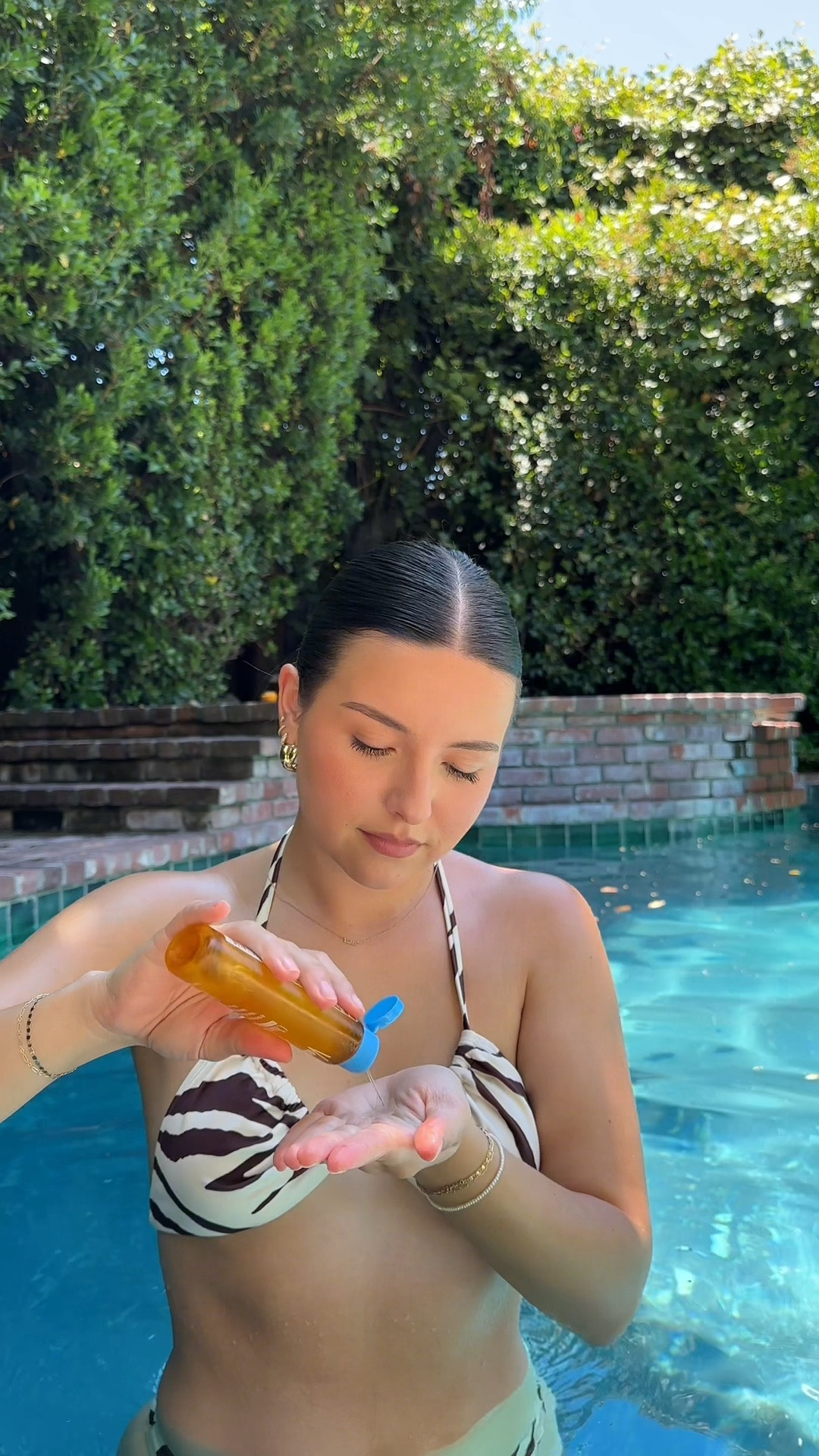 key to staying glowy (& SPF protected) in the summer 🌞 Vacation Chardonnay Oil has SPF 30!

also linking my sunglasses!

sale alert, summer swimsuit, bikini, pool party, ootd, body oil, sunscreen oil, tanning oil, neutral bath in suit 

#LTKSaleAlert #LTKSwim #LTKHome