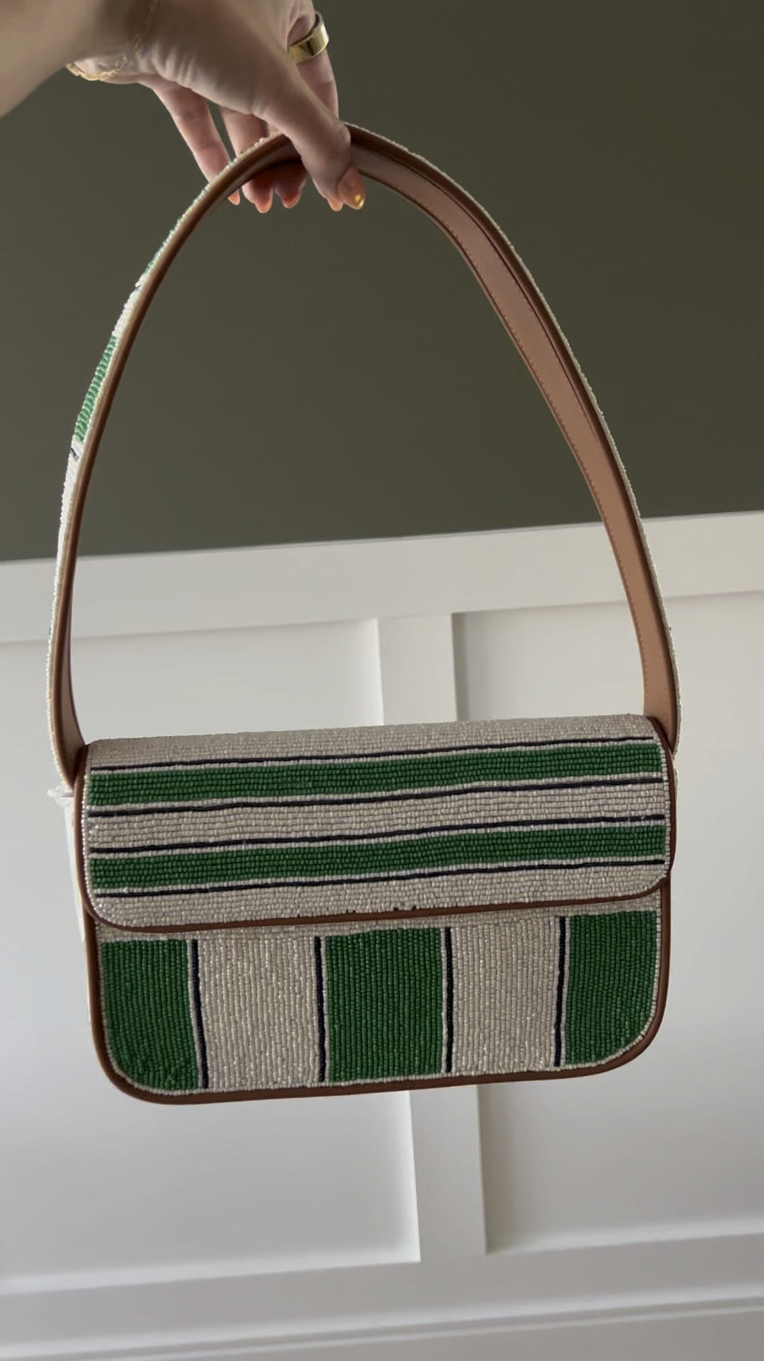 She’s a cutie!! Lots of Staud Tommy bags in stock at Neiman & Saks!

#LTKItBag #LTKWedding #LTKStyleTip