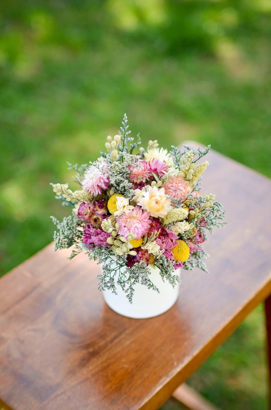 Bring soft wildflower charm indoors with this handcrafted spring arrangement made in a 3” white ceramic pot. Designed with delicate seasonal blooms inspired by wildflowers, each piece is uniquely made and full of natural beauty. At approximately 6–7 inches tall and wide, this petite arrangement is perfect for desks, shelves, bedside tables, or small spaces that need a touch of spring. Handmade in Virginia and designed for indoor use, it’s a sweet, thoughtful decor piece that feels fresh and effortless.

#LTKHome #LTKStyle #SpringDecor #WildflowerDecor #FarmhouseStyle #CottageStyle #SmallSpaceDecor #HomeDecorInspo #NeutralHome #SpringHome #GiftIdeas #HandmadeDecor #VirginiaMade

#LTKHome #LTKWedding #LTKSeasonal