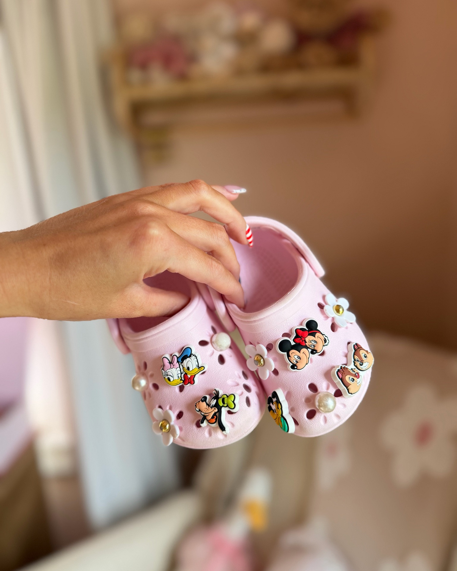 Had to get Miss Evie some new charms and finally got my hands on this Mickey and friends set!!! It’s been sold out online and our store had them. SOO cute!!! She loves! 

Floral crocs, pink crocs, Mickey and friends charms, chip and dale Disney, Daisy and Donald

#LTKmomlife #LTKKids