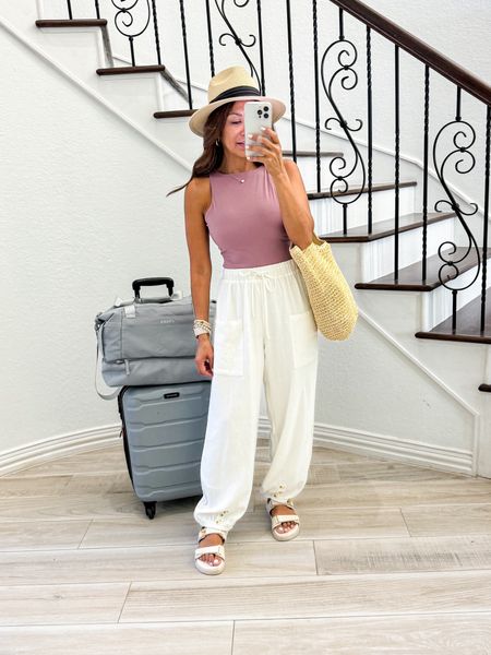 Outfit to first day of cruise!
Top in small(looks like a bodysuit but it’s not).
Pants in small(so comfy): linked in 2 Amazon stores. Bought mine from Anrabes.
Sandals fit tts.
Straw hat and all bags are linked.
Vacation outfit, travel outfit 

#LTKfindsunder50 #LTKtravel #LTKover40