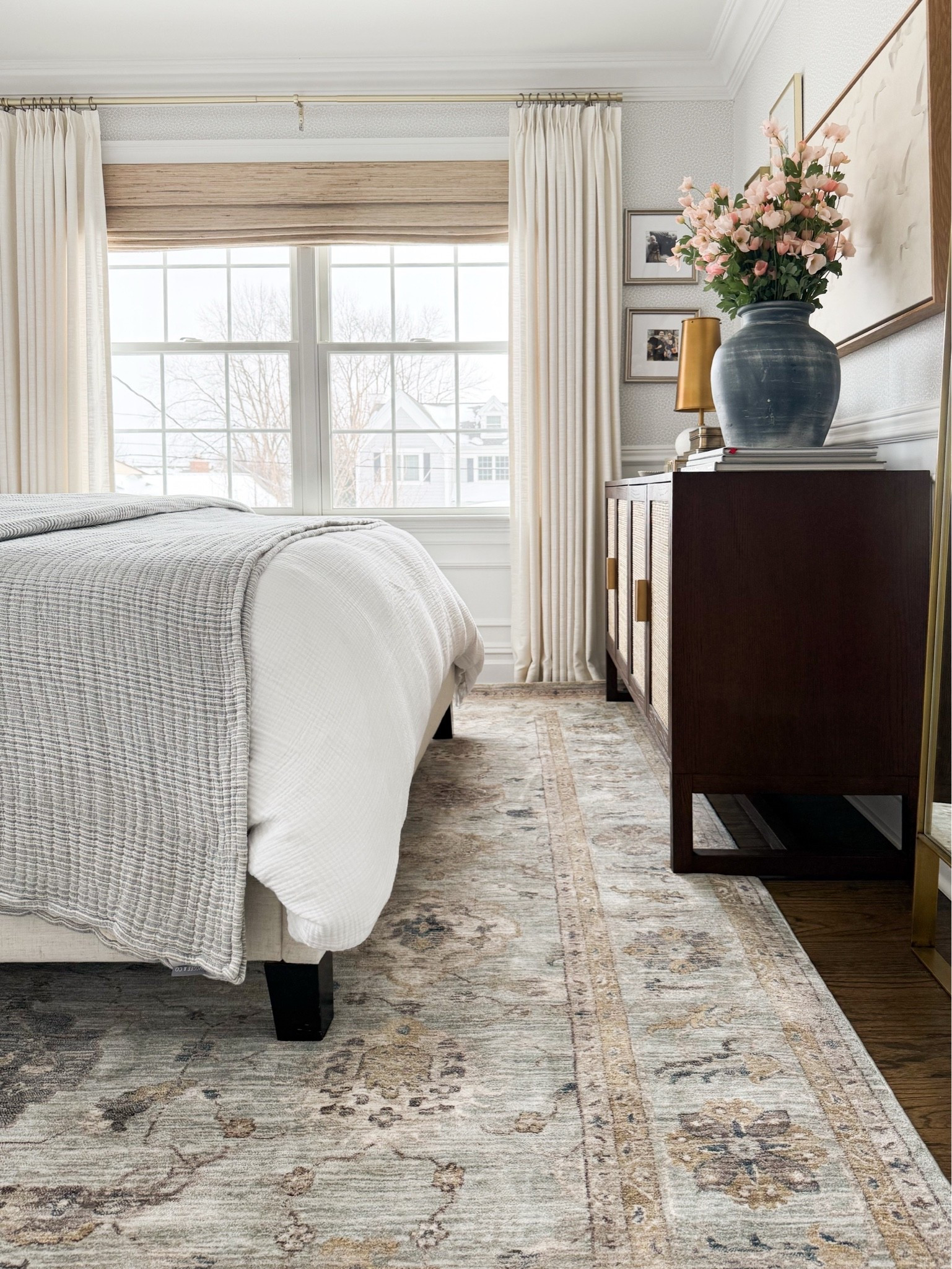This rug brings a soft, lived-in feel to our primary bedroom while adding just enough pattern to keep the space interesting. I love the muted neutral palette and vintage inspired design because it creates a calm, layered look that's easy to decorate around. It's incredibly versatile, timeless, and the perfect foundation for a relaxing bedroom.
Primary bedroom rug, bedroom area rug, neutral rug, vintage inspired rug, Loloi rug, bedroom décor, timeless home, soft neutral rug, traditional home, area rug, GirlOnTheHudson

#LTKHome #LTKOver40 #LTKSeasonal