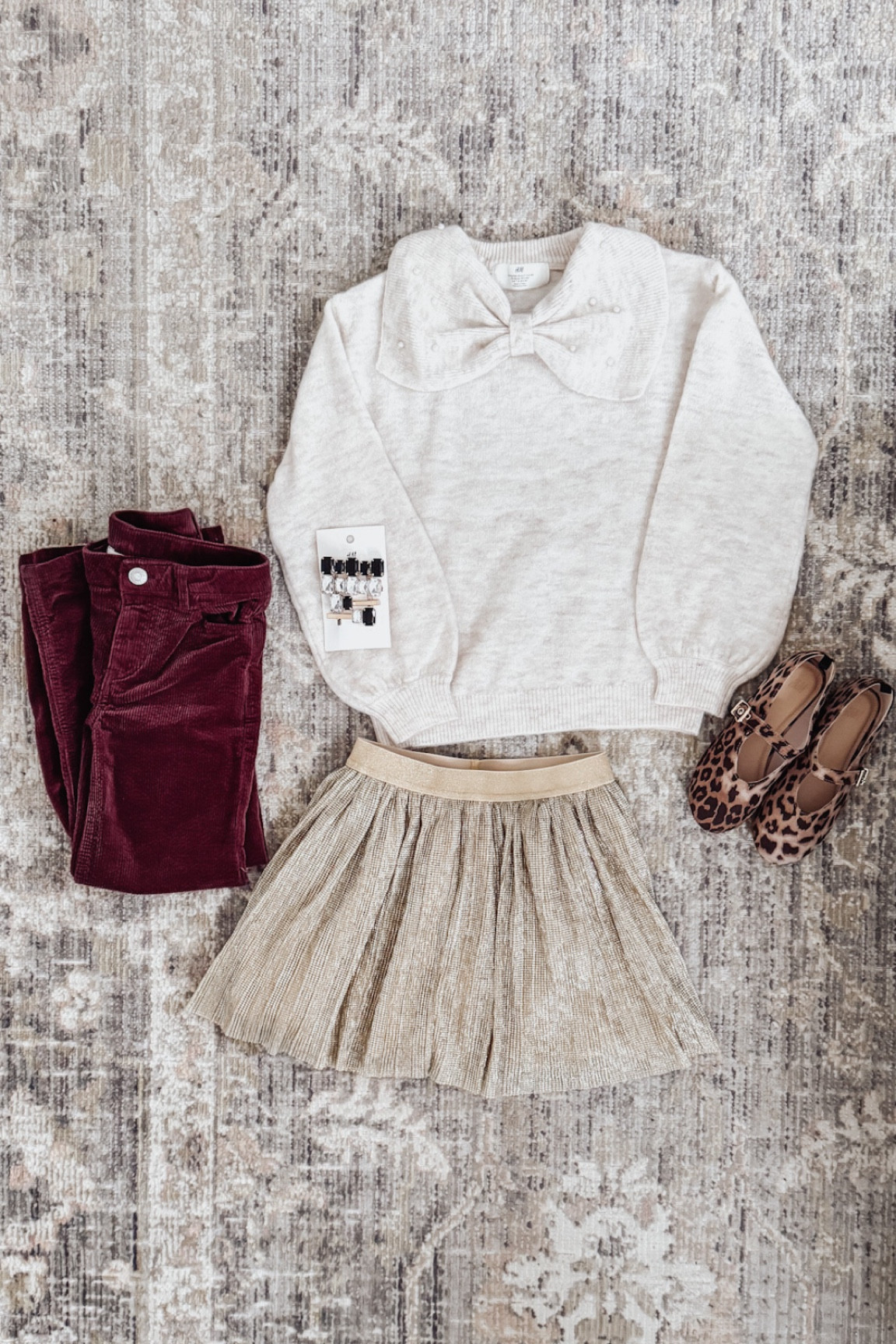 Holiday outfit idea for girls 🌲💡 - here are a few of the things I got for my 7 year old daughter. This bow sweater, corduroy pants, gold skirt, & leopard mary Jane flats can be mixed & matched to create a couple different looks ✨

#LTKStyleTip #LTKHoliday #LTKKids