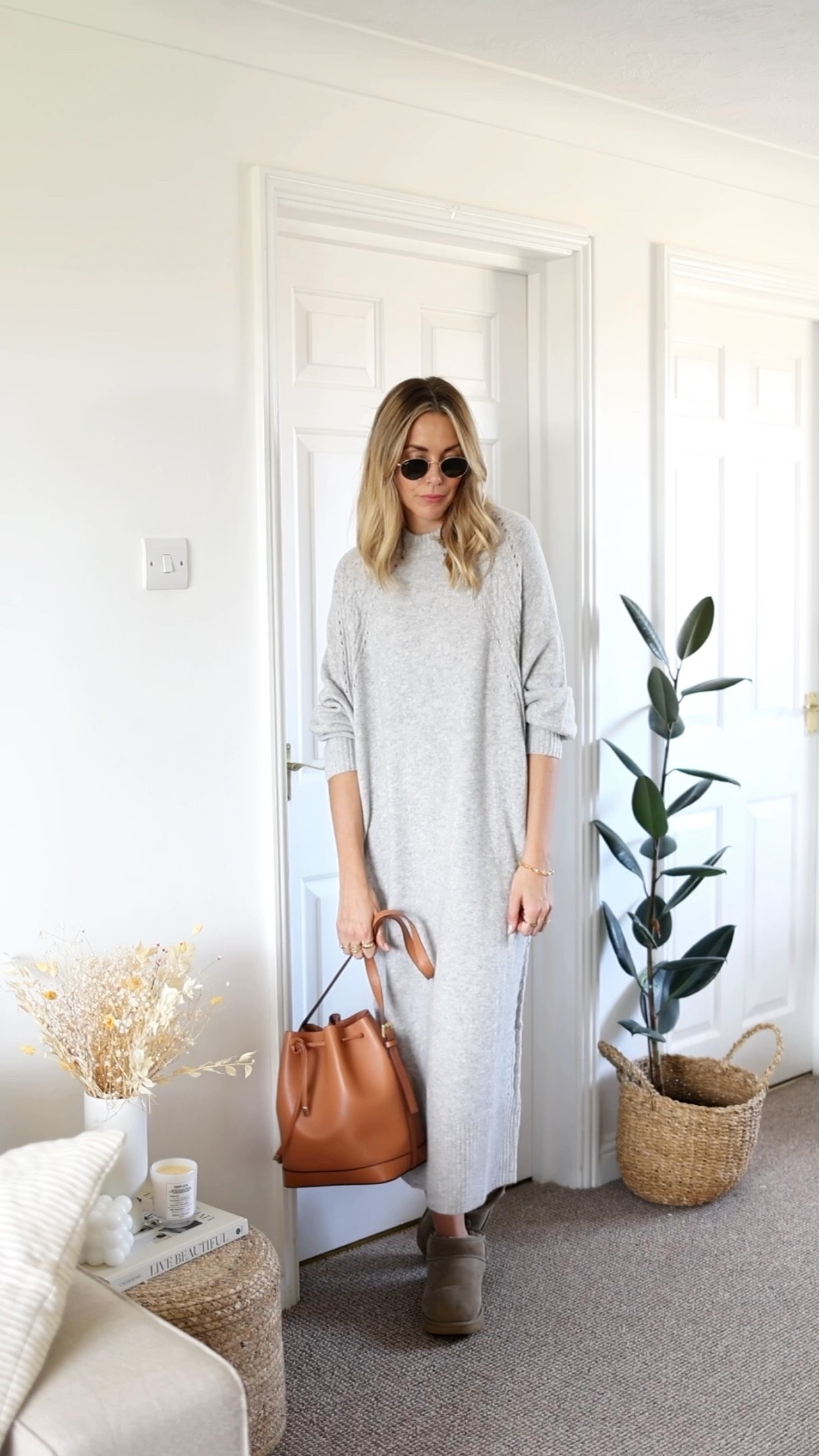 Knitted dress 
Jumper dress
Knitted maxi dress 
Ugg ultra mini 
Bucket back 
Black boots 

#LTKeurope #LTKSeasonal #LTKstyletip