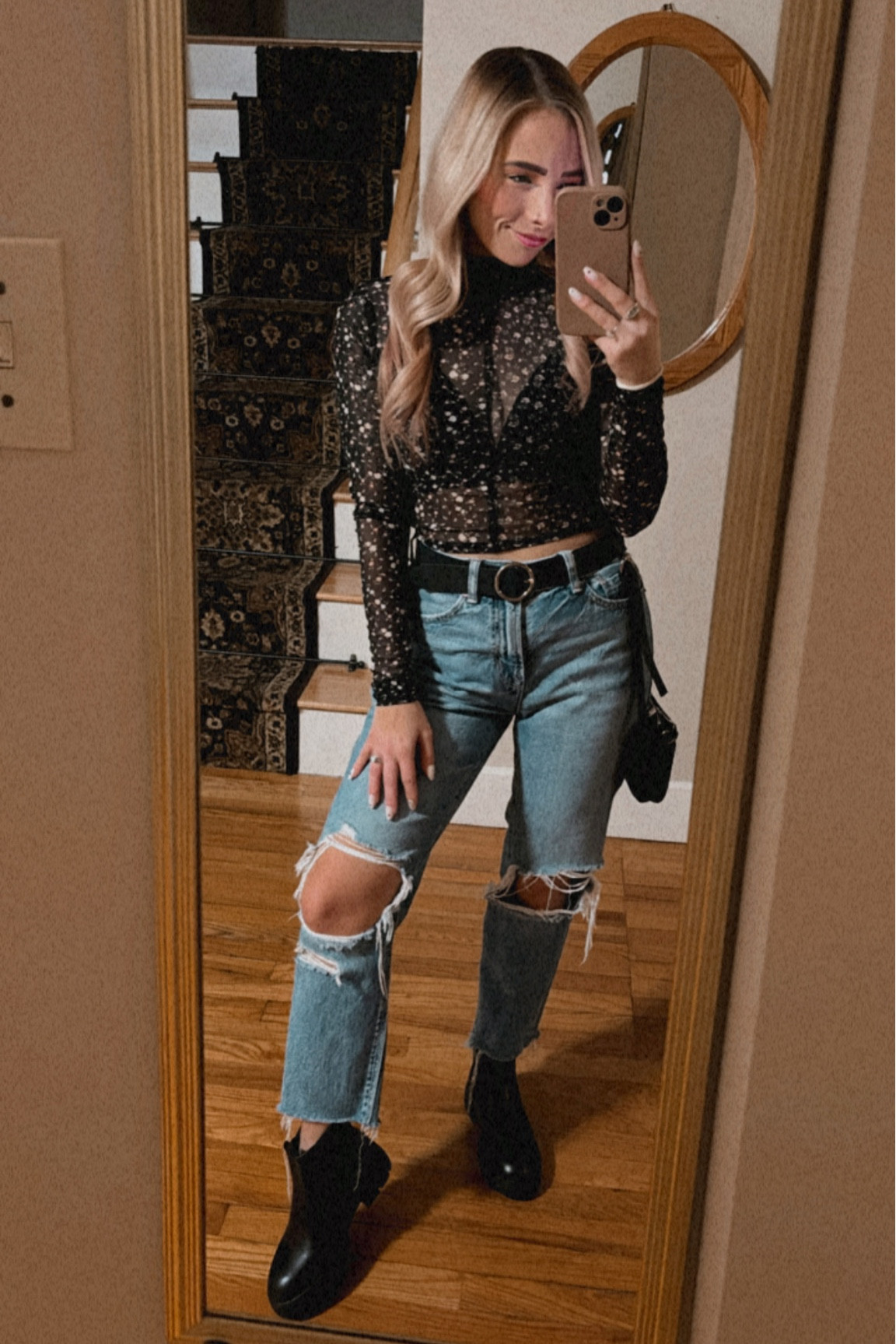 Black mesh top, floral mesh top, layering top, mesh layering top, distressed mom jeans, black Chelsea boots, black belt, black crossbody

#LTKstyletip #LTKfindsunder50 #LTKsalealert