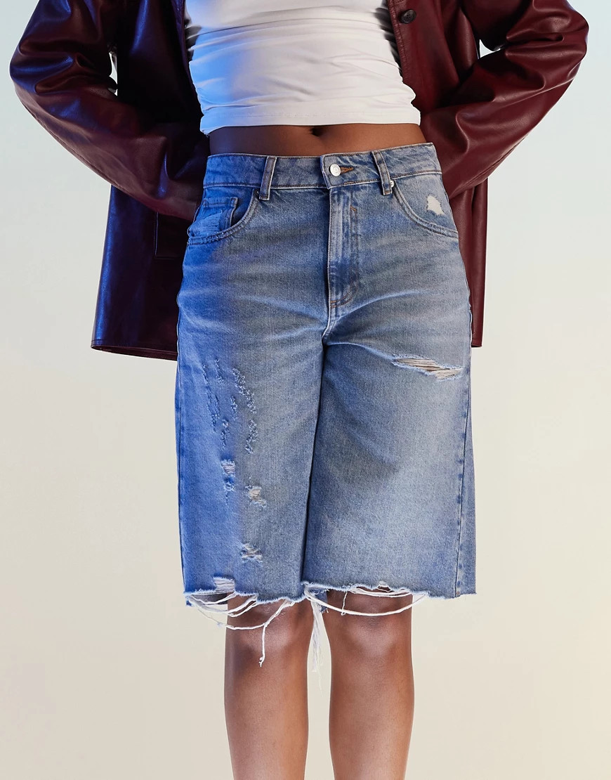 ASOS DESIGN baggy longline denim jorts with rips in bleach wash-Blue | ASOS (Global)