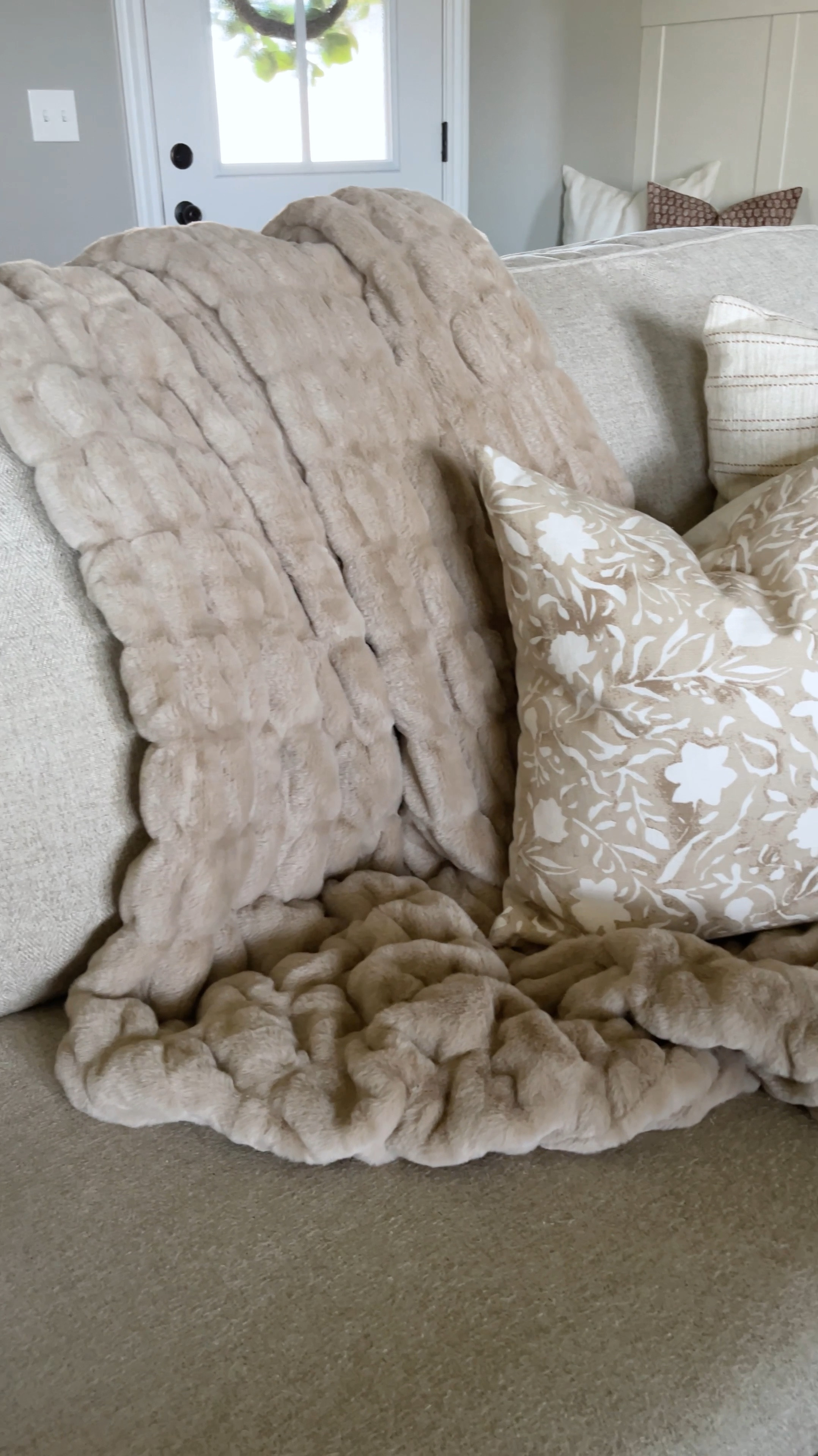 The most luxurious throw blanket EVER! I am loving this faux fur ruched throw blanket from Battilo - it is sooo soft 😌 I love that it’s thick, but not hot, and it’s double sided too! This is the 50x60 in the color tan 🤎

#LTKhome #LTKVideo #LTKfindsunder100