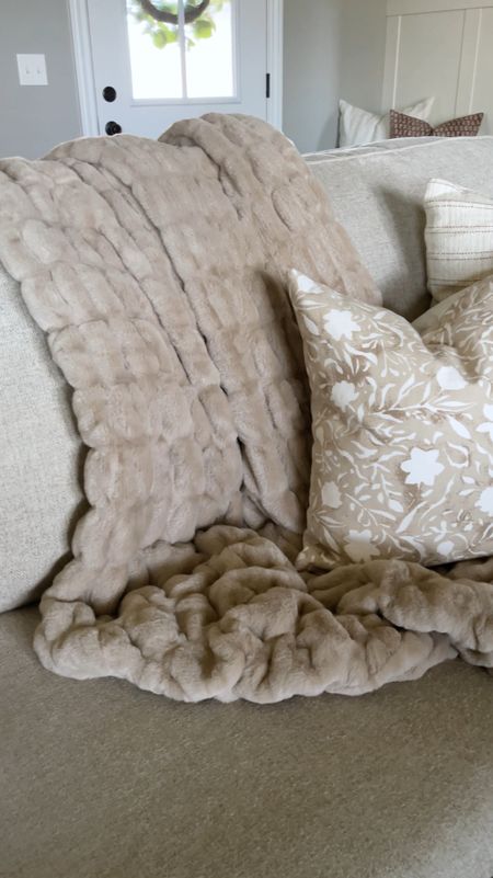 The most luxurious throw blanket EVER! I am loving this faux fur ruched throw blanket from Battilo - it is sooo soft 😌 I love that it’s thick, but not hot, and it’s double sided too! This is the 50x60 in the color tan 🤎

#LTKhome #LTKVideo #LTKfindsunder100