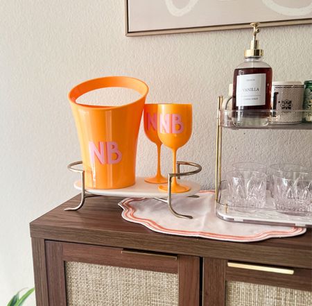 Acrylic ice bucket and acrylic champagne flutes from Sprinkled with Pink 🩷🧡

#LTKParties #LTKHome #LTKFamily