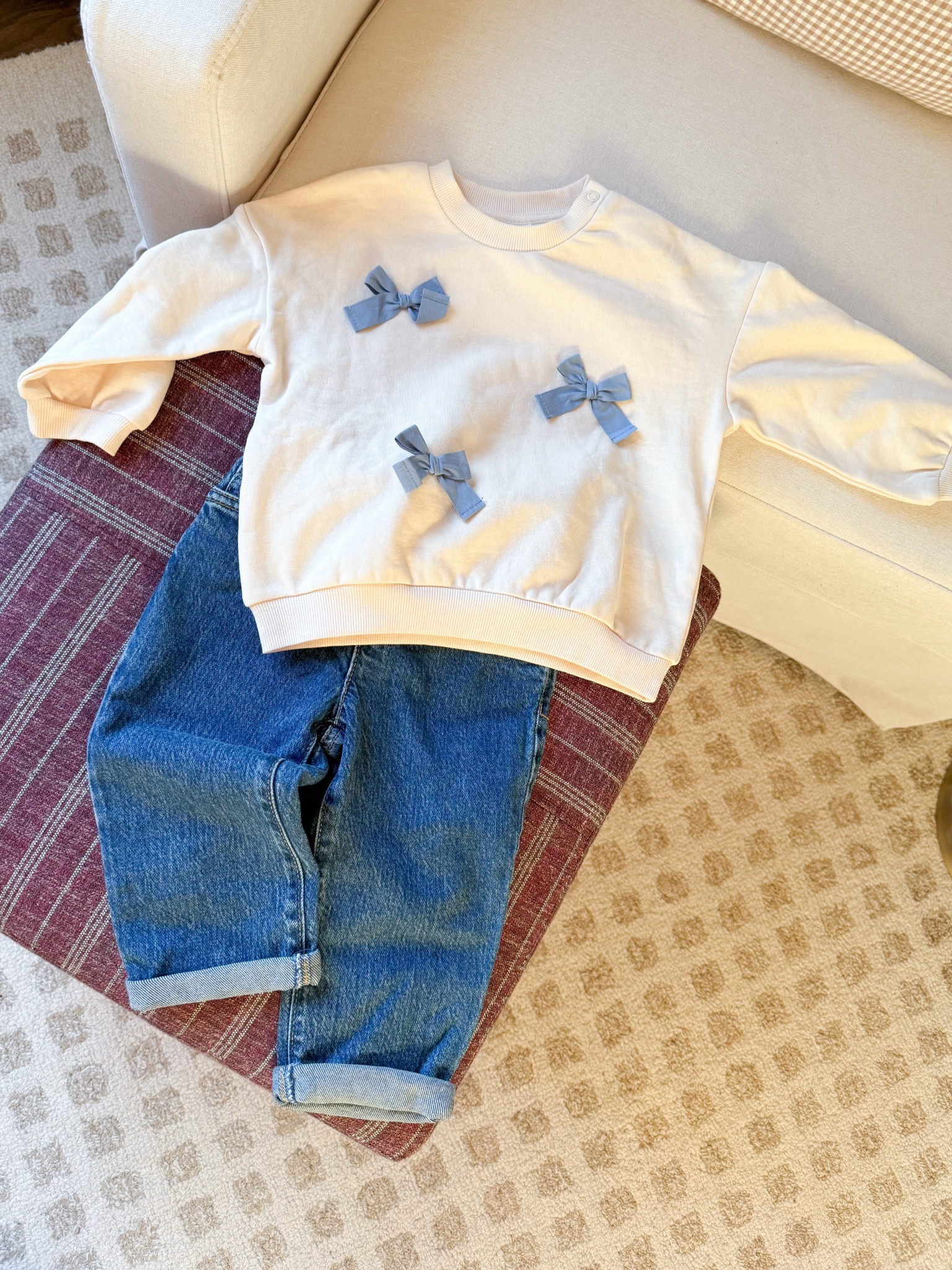 This little girl outfit is perfection. A bow sweatshirt and paper bag waist jeans - stop 🥰! 

#LTKSaleAlert #LTKFindsUnder50 #LTKKids