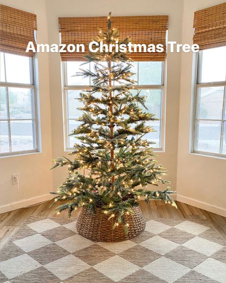 Amazon Christmas tree. Tree collar. Checkered rug. Boho Christmas tree. 

#LTKHoliday #LTKhome #LTKCyberweek