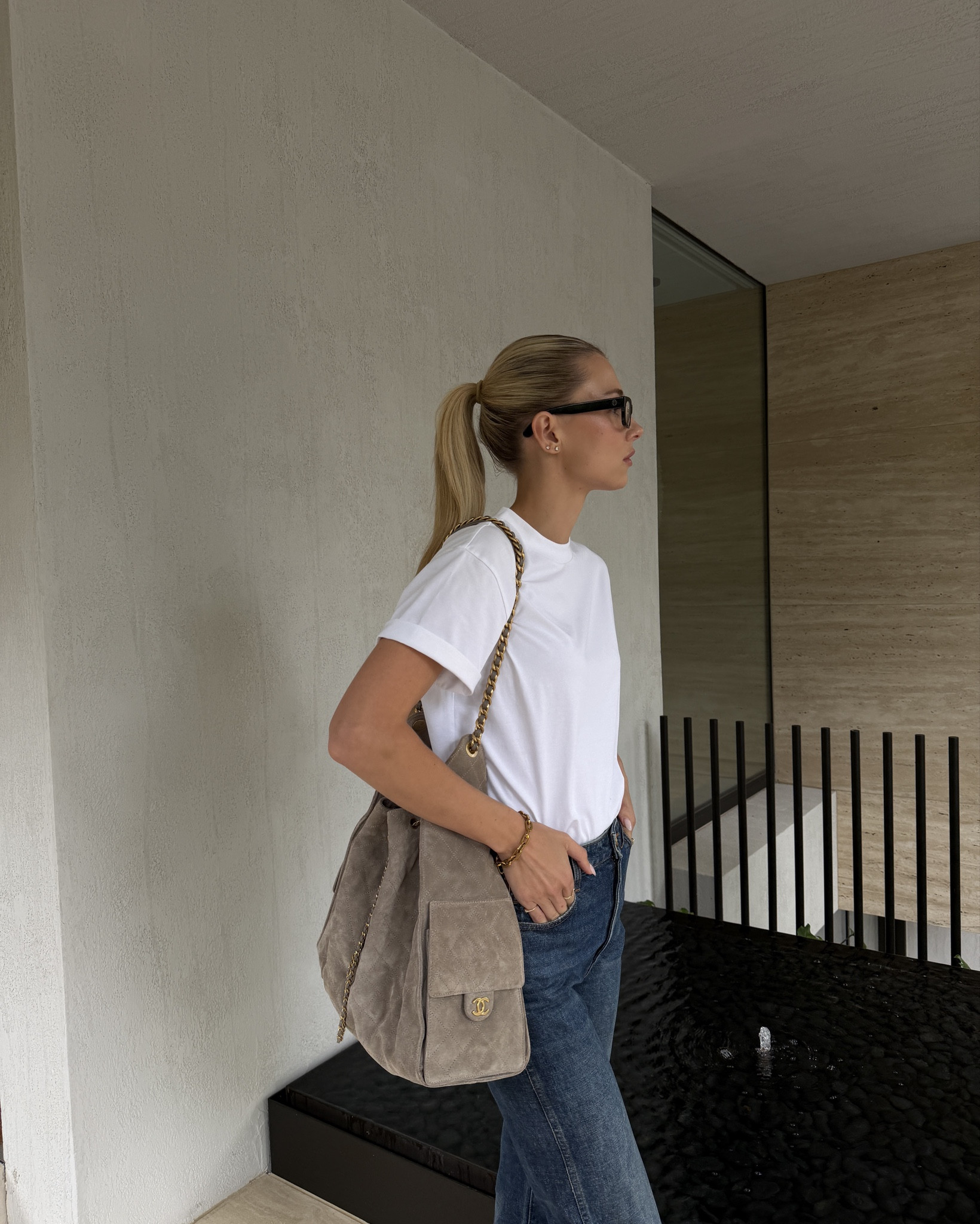 Weekly uniform, jeans, a great basic tee and statement bag. 

#LTKstyletip