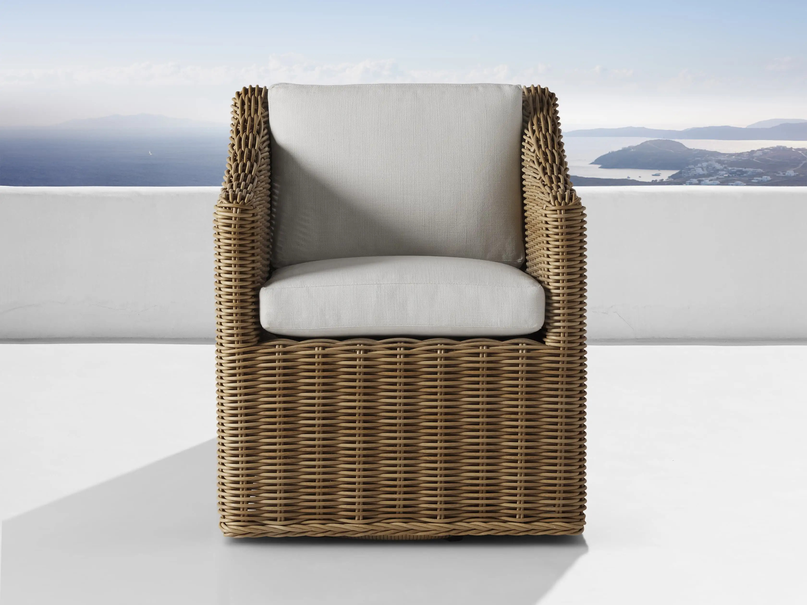 Montauk Outdoor Swivel Dining Arm Chair in Sailcloth Seagull | Arhaus