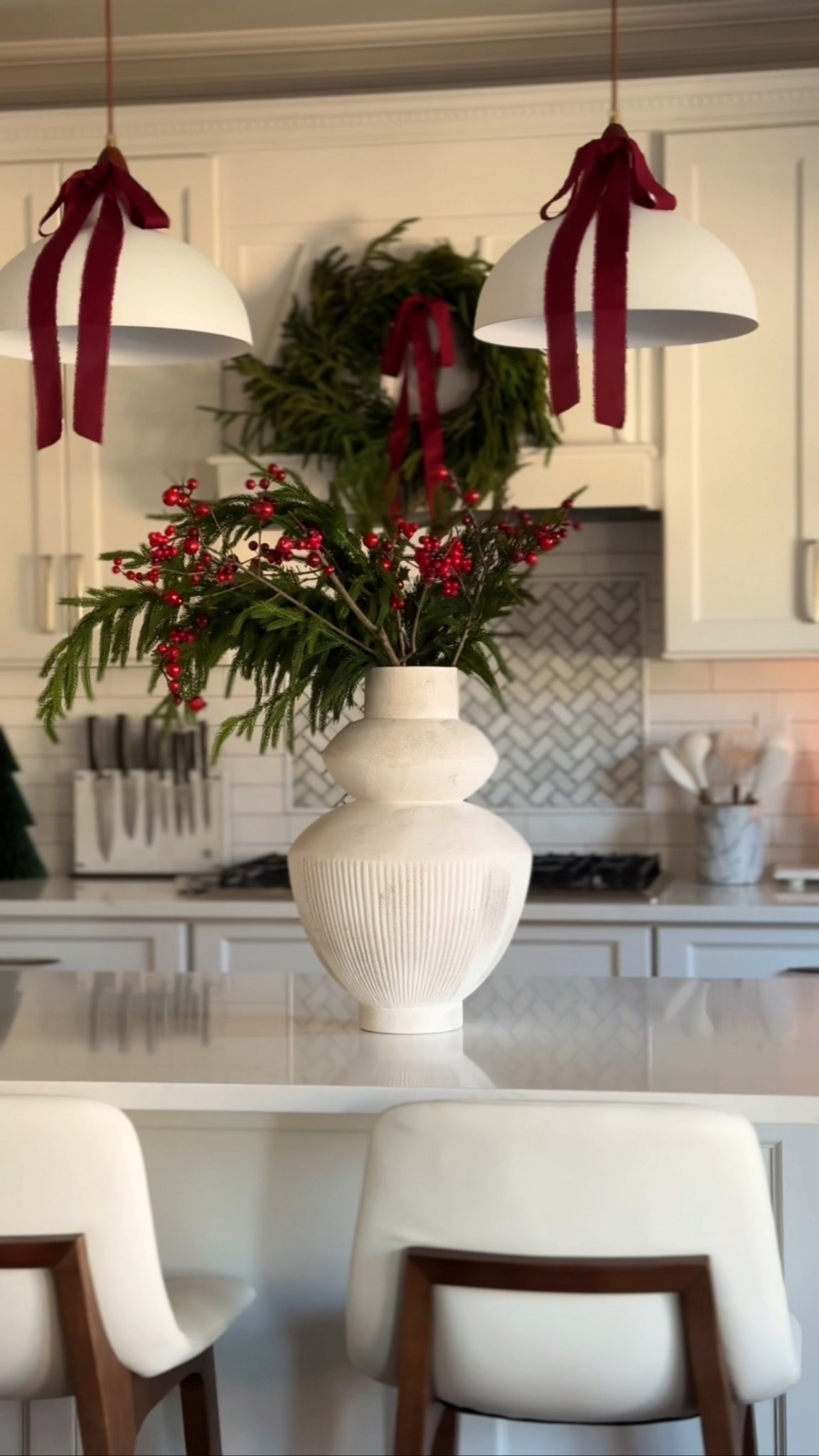 Kitchen holiday styling

Christmas, decor inspo, holiday kitchen

#whitekitchen #holidaykitchen #red #greenery #wreath #burgundy #bow #christmas #vase #crateandbarrel #afloral

#LTKHoliday #LTKSeasonal #LTKHome