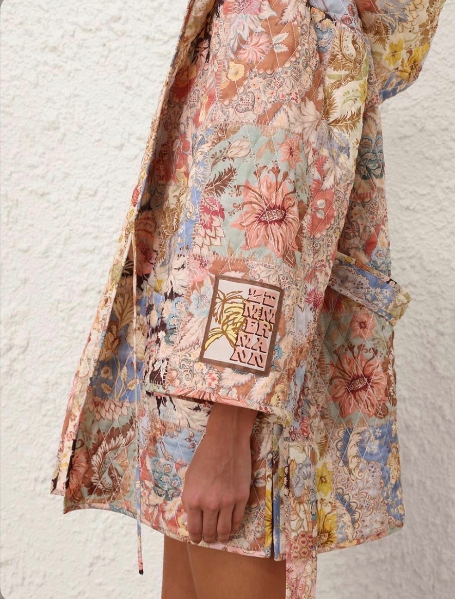 Zimmerman Daylight Quilted Robe

The Daylight Quilted Robe in Patch Multi from our Resort Swim 2026 Collection. A cotton quilted mini robe featuring a plunging V-neckline, self-tie waist belt and a functional hood.