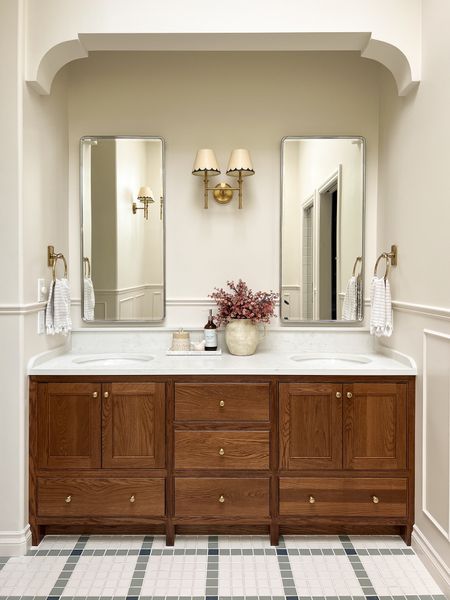 Bathroom vanity sources 

Brass knobs, double sconce, medicine cabinet, faux floral, rustic vase 