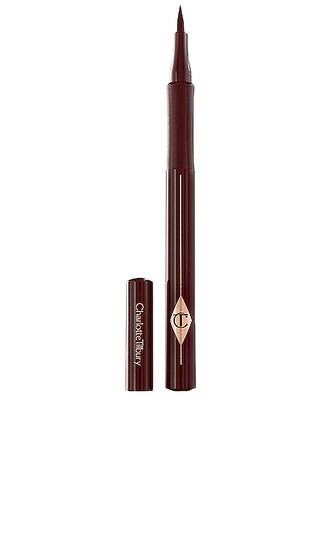 Charlotte Tilbury The Feline Flick Liquid Eyeliner in Super Brown. | Revolve Clothing (Global)