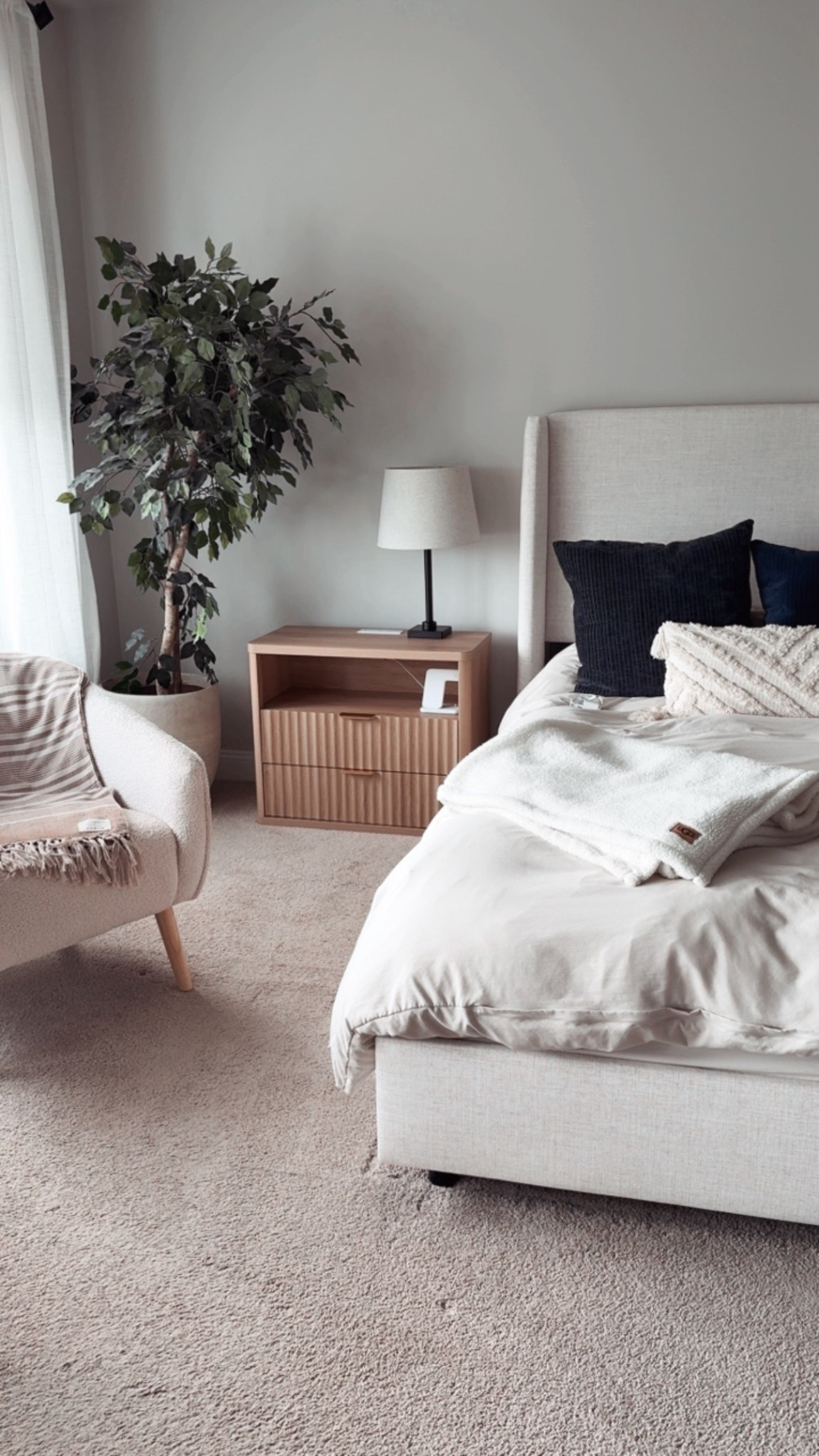 ✨ Neutral tones + soft textures = bedroom bliss. 💤 From the boucle chair to the ribbed nightstand, every detail feels warm, minimal, and inviting. Shop the look and bring this cozy vibe home. 🪞🪴🕯️

#NeutralHome #CozyBedroom #LTKHome #LTKBedroom #LTKDecor


#LTKFindsUnder100 #LTKHome