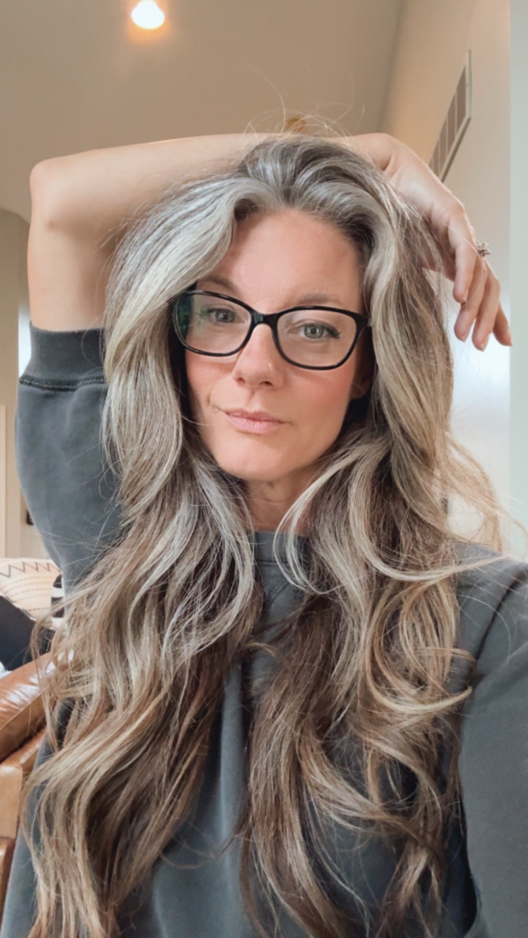 One of the # 1 questions I get is about my hair. And while I have natural greying, thick, curly hair, this is how I go from air drying, sleeping on it, looking blah to a quick ready-to-go look in less than 10 min. 

And since most of that time is spent curling the waves, I work during the process! 

Since my hair is so long currently, I use a long barrel curling iron to get the job done. 🙌🏻
And yes, that’s it. No products except shampoo and conditioner  🤷🏼‍♀️

#LTKBeauty #LTKOver40 #LTKGiftGuide