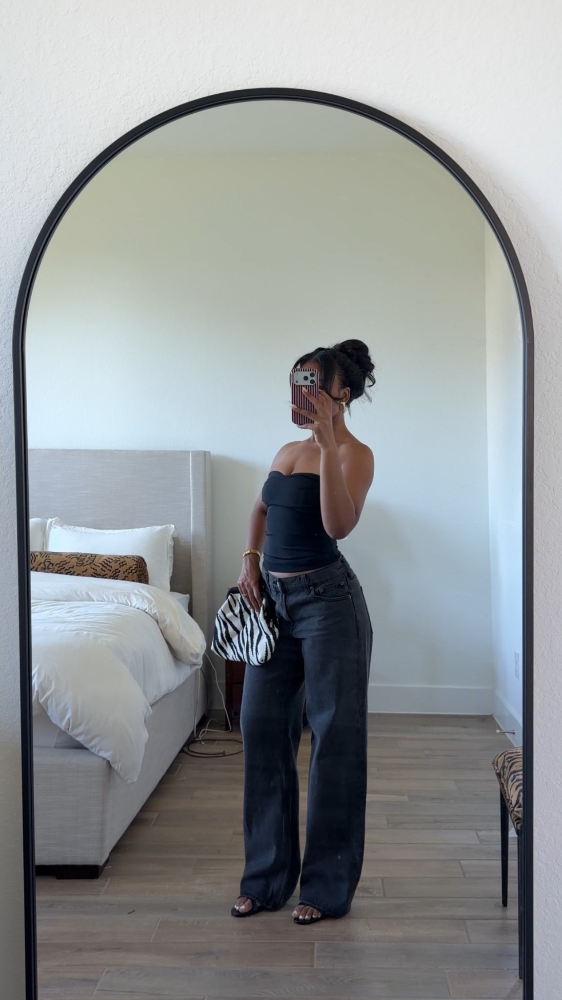 Casual weekend outfit to go get some barbecue. Black @Zara  tube top, @abercrombie  black wash jeans, and this cutie zebra clutch from Amazon 

#LTKgrwm #LTKootd