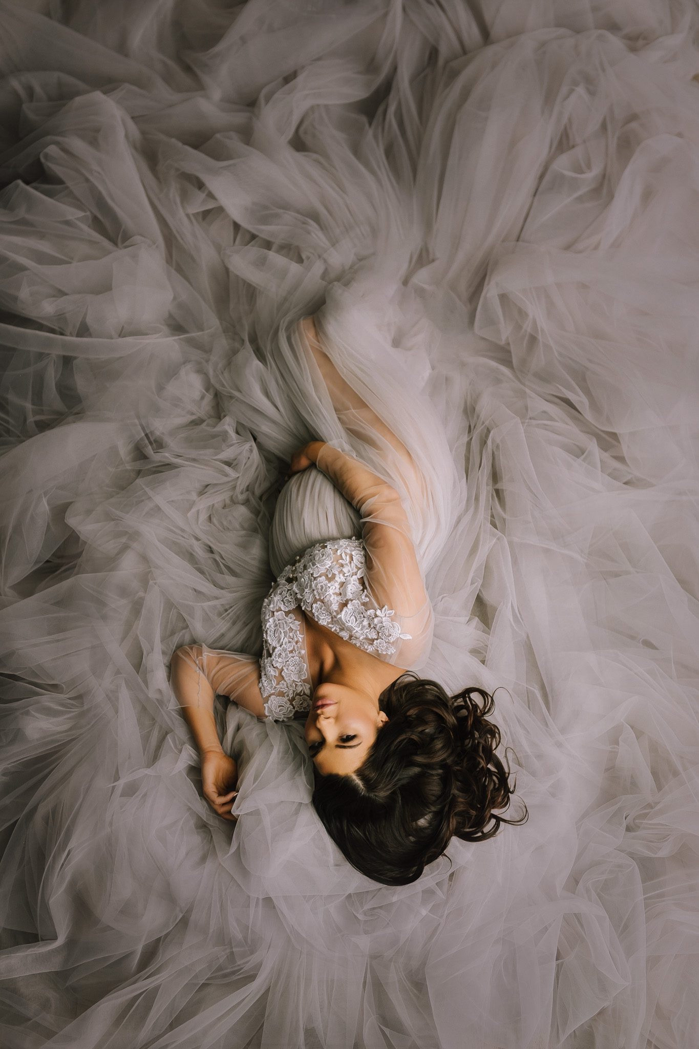 Soft blush and layers of tulle photograph like a dream for maternity portraits. This romantic gown keeps the focus on shape, movement, and all the beautiful details of motherhood. I linked a few blush and pink maternity gowns with a similar ethereal feel. 

 #LTKmomlife #LTKBump