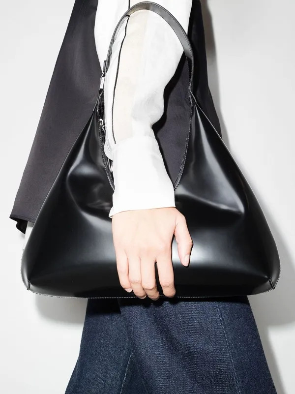 Amber leather shoulder bag | Farfetch Global