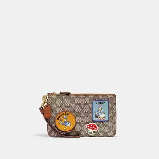 Disney X Coach Small Wristlet In Signature Textile Jacquard With Patches | Coach (US)