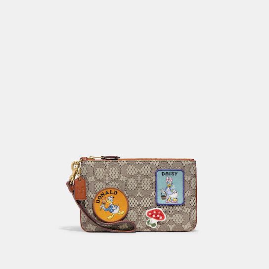 Disney X Coach Small Wristlet In Signature Textile Jacquard With Patches | Coach (US)