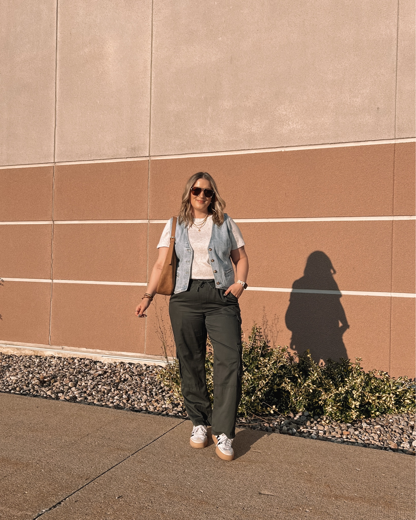 Casual midsize fall outfit - my fave basic tee from old navy (size L), Abercrombie denim vest (size L), black cargo pants (size L, also linked similar). My adidas Sambae sneakers are the comfiest shoes I own! I’m usually a 9.5-10 and got a 9 in these 


#LTKstyletip #LTKmidsize #LTKautumn
