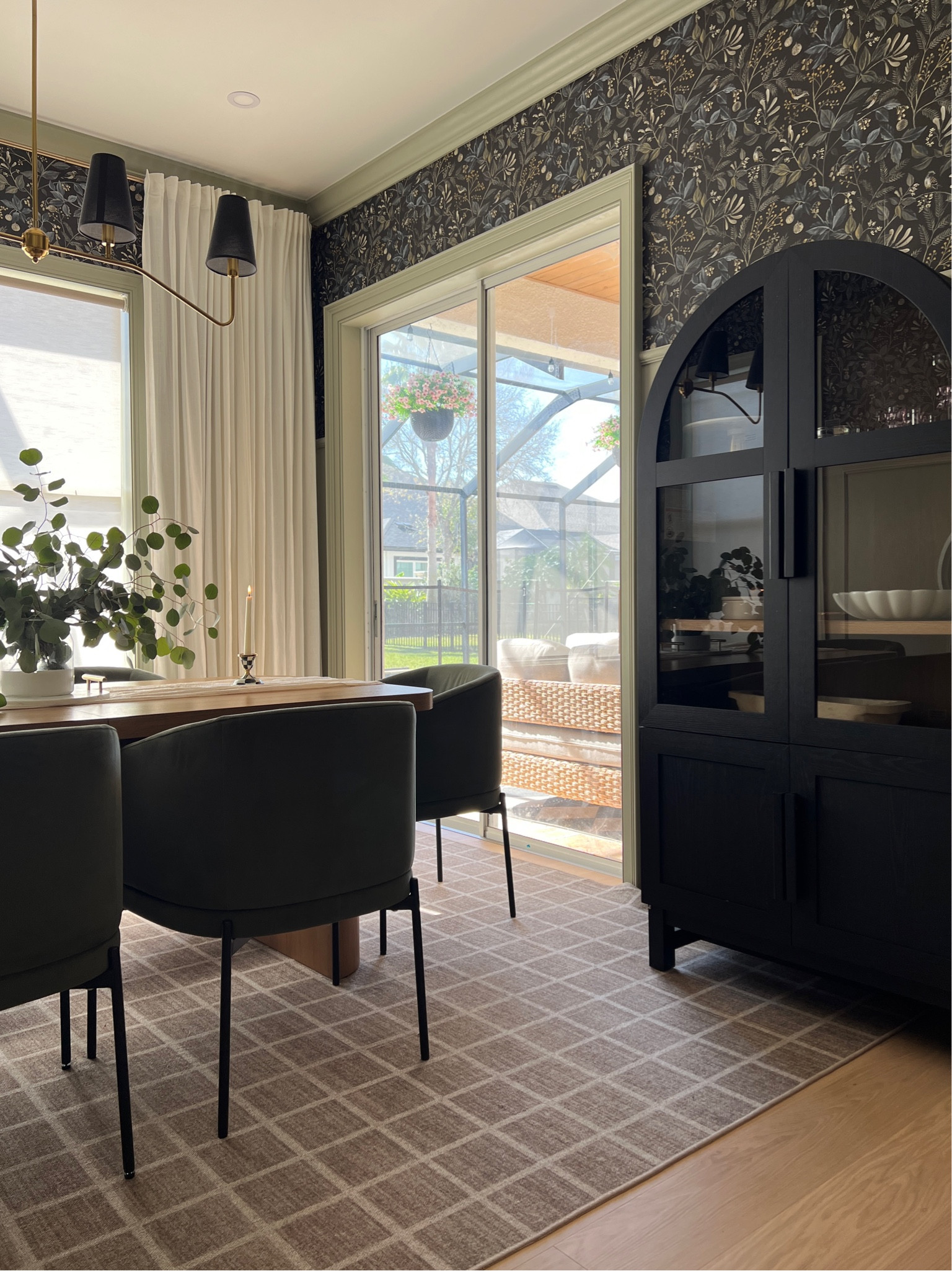 It may have taken  14 months for our dining room to come together but it was totally worth the wait. I added picture molding, new paint and wallpaper - and that gave the room so much character. Then I wanted to furnish the room on a budget and found some great pieces that completed the room beautifully. I can’t believe how great the quality of the dining table, chairs and arch cabinet are given the price point  

#LTKFamily #LTKSeasonal #LTKHome