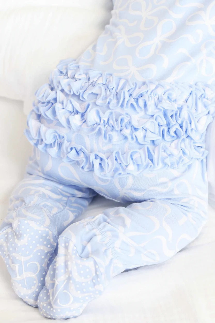Blue-tiful Bows Ruffle Zipper Footie | Caden Lane