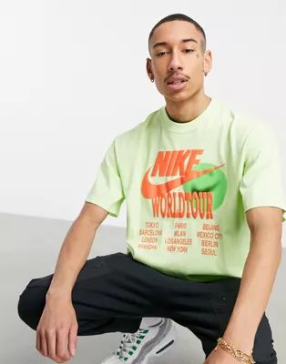 Nike World Tour Pack graphic oversized T-shirt in lime | ASOS | ASOS (Global)