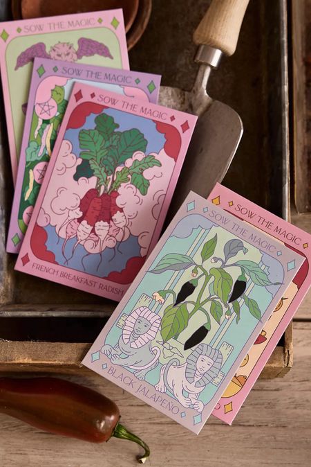 Discover the perfect gift for the green thumb in your life or a delightful addition to your own garden! This exclusive seed collection from Sow the Magic includes five flavorful vegetables, each tucked into beautifully designed, tarot-inspired packets. 

Sow the Magic’s organic, non-GMO seeds are sustainably sourced in the USA, ensuring that you're planting nothing but the best. All seeds are open-pollinated and/or heirloom varieties, promising a rich, bountiful harvest.

Included in this enchanting collection are:
🌶️ Black Hungarian Jalapeno (Capsicum annuum)
🍅 Crazy Cherry Tomato (Solanum lycopersicum)
🥒 Dragon Tongue Bush Bean (Phaseolus vulgaris)
🌱 French Breakfast Radish (Raphanus sativus)
🥒 Mexican Sour Gherkin Cucumber (Melothria scabra)

Nurture your garden with these unique, flavorful seeds and experience the magic of growing your own vegetables. Order your collection today and sow the magic! 

#LTKHome #LTKSeasonal #LTKFindsUnder50