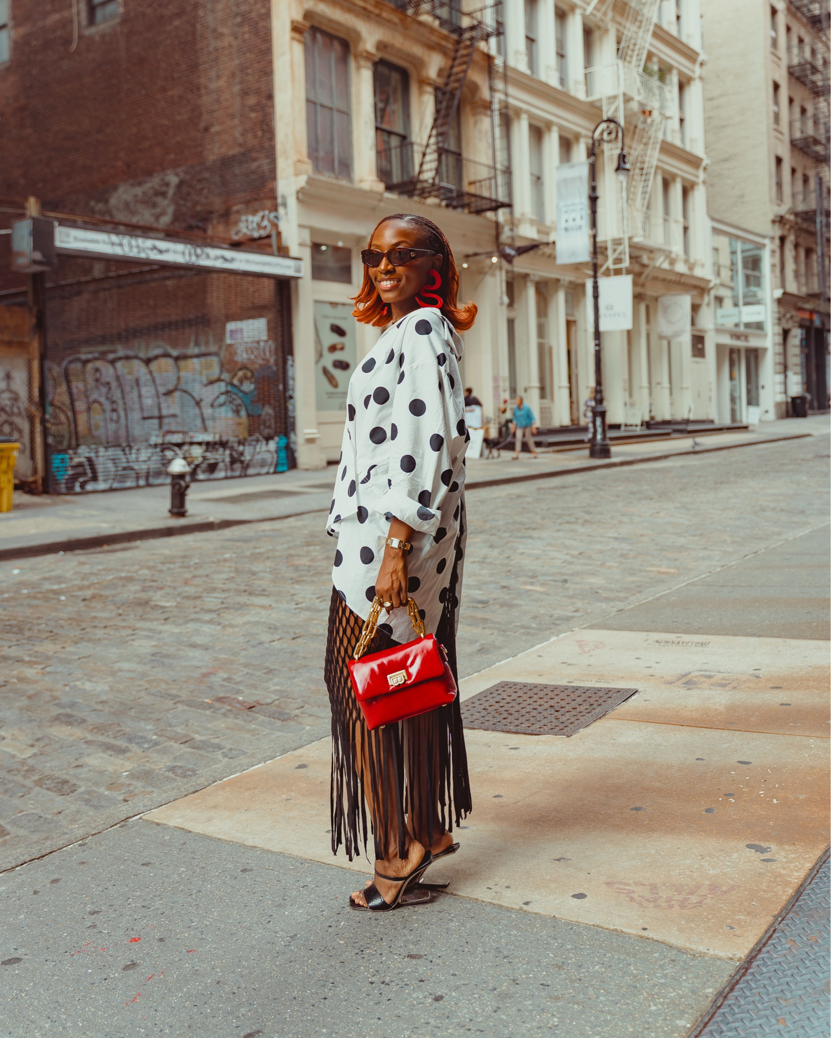 Polka dots pairs really well with bold colors and textures! 💥
- Laser cut skirt if from Kai Collective (Size Small)
- Bag is from Brandon Blackwood! 
- Earrings were made by @Anybyanu_ on IG! 
- Polka Dot Top is a size 4!