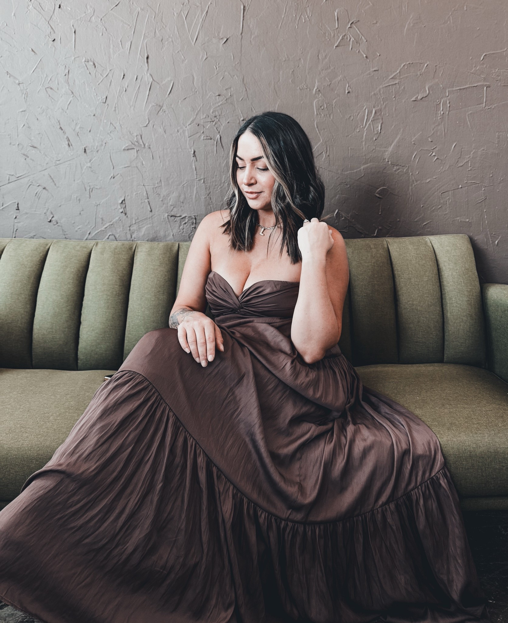 Brown strapless flowy dress.

#LTKSeasonal #LTKFindsUnder100 #LTKParties