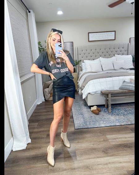 Fall fashion code LACY25 
Graphic tee size small
Faux leather mini skirt size small

Boots are Amazon fashion and true to size 

#LTKsalealert #LTKfindsunder50 #LTKstyletip