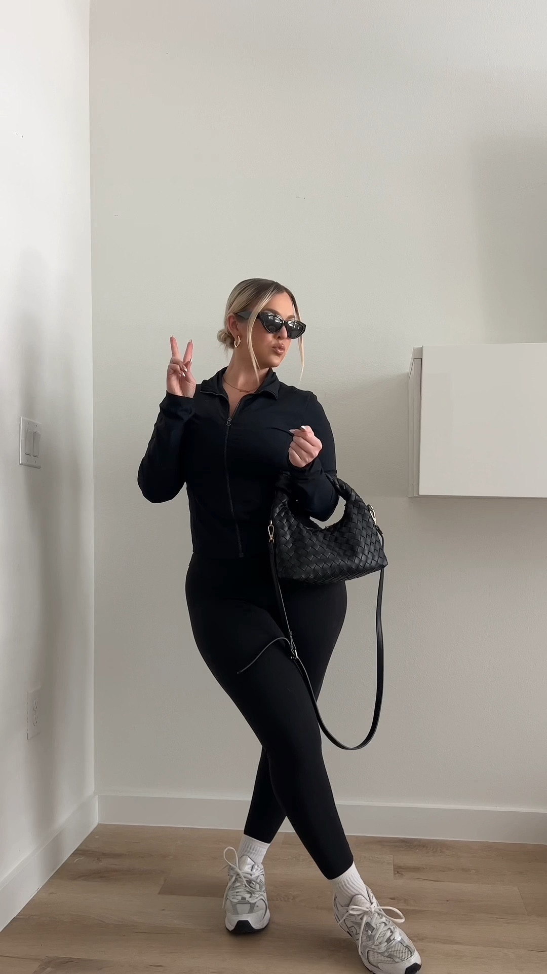 how to look chic & effortless at the airport ✈️🖤 this bag is everything! #bottega #amazonleggings 

#LTKfitness #LTKfindsunder100 #LTKmidsize