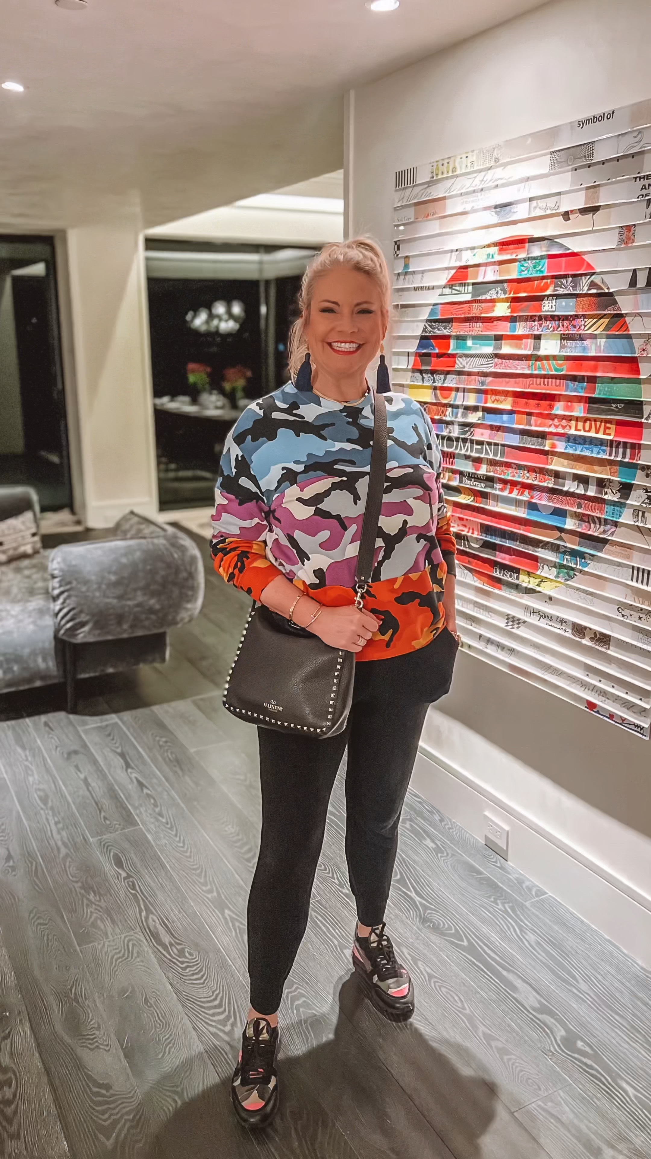 I put this cute Valentino outfit together. Rockrunner sneakers, camouflage sweatshirt, and black rock stud crossbody. February is Valentino’s biggest sales. 💚💚💚

#LTKSpringSale #LTKSeasonal #LTKMostLoved