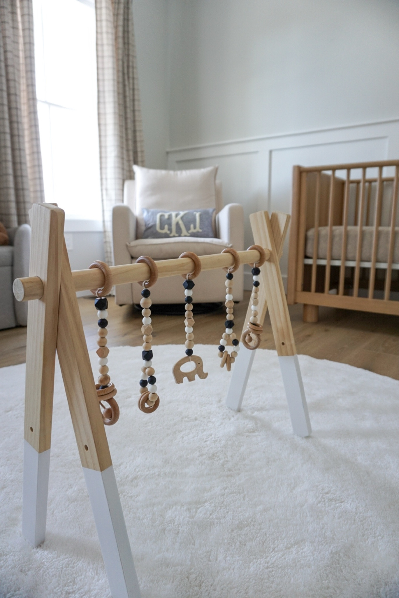 Baby boys neutral  nursery 🧸

• west elm, amazon finds, Etsy finds, baby room, plaid curtains, glider chair, changing table, washable rug, storage bench, custom details


#LTKBaby #LTKHome #LTKKids