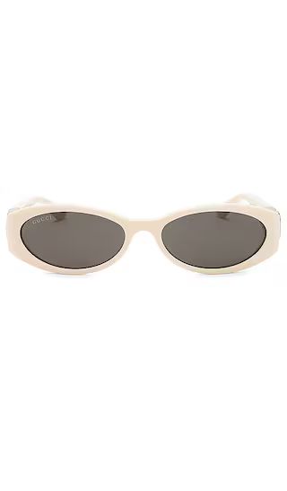 Oval Sunglasses in Ivory | Revolve Clothing (Global)