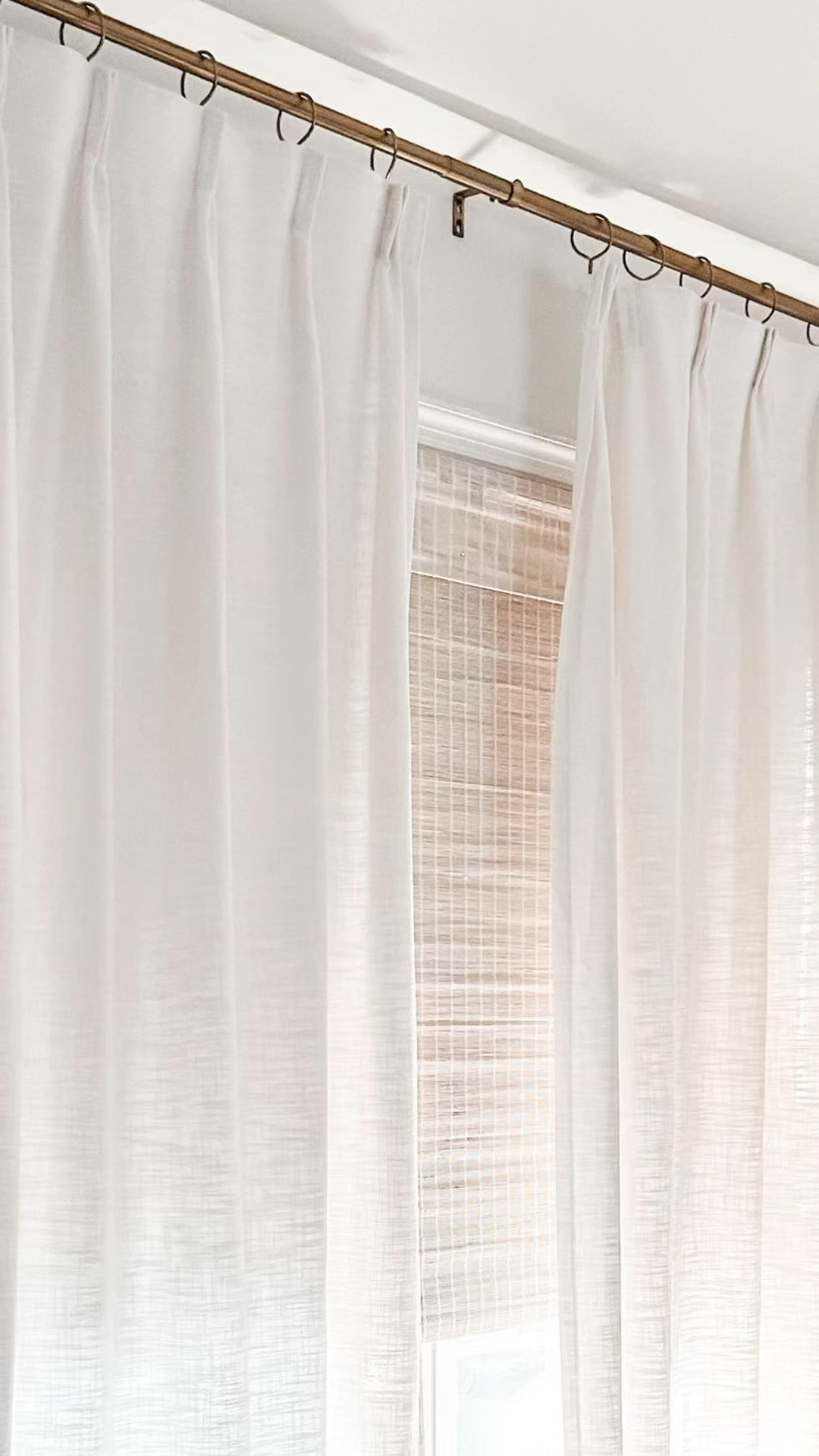 Love our new room darkening curtains in our bedroom from Amazon! 
Also loving the woven Roman bamboo shade that we were able to custom order for the perfect size on Amazon!

Woven shade, bamboo shade, neutral window treatment, Amazon drapes, pinch pleat curtains, faux linen curtains. Curtain clip rings, gold curtain rod, woven Roman shade. 
#amazon

#LTKhome #LTKFind #LTKstyletip