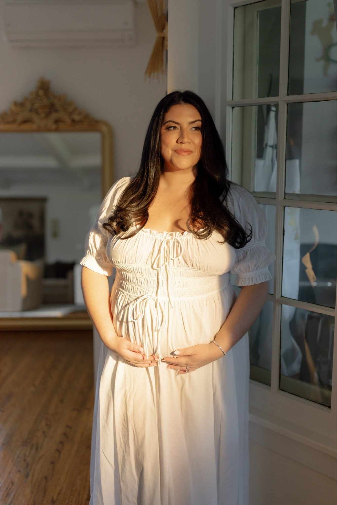 The perfect white midi from Doen, sized up for pregnancy

#LTKootd #LTKSeasonal #LTKBump