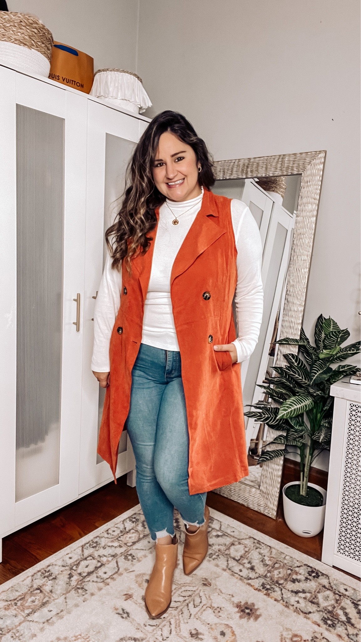 Wearing an L in the long vest
Wearing an L in the mock 
Wearing a 12 in the skinny jeans

Fall outfit, long vest, Sofia vergara jeans, Walmart jeans, white mock neck, brown booties 

#LTKSeasonal #LTKunder50 #LTKcurves