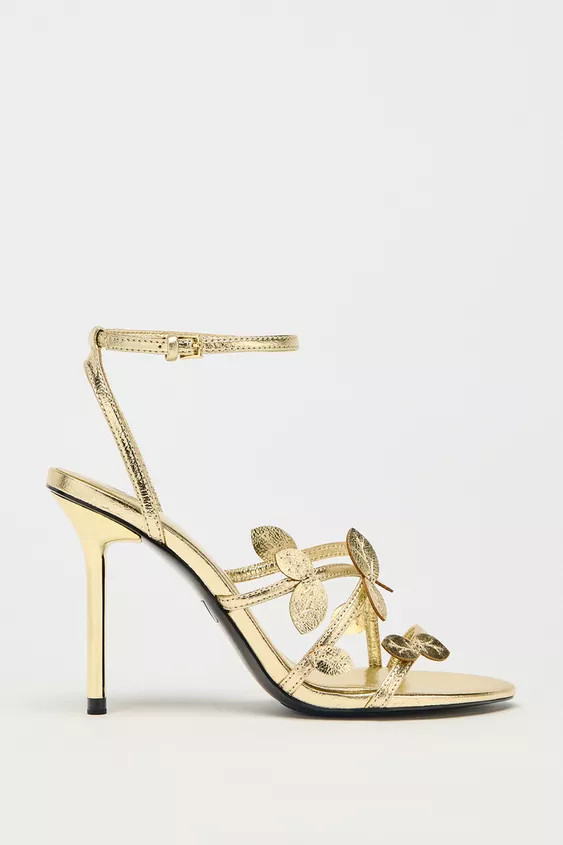 Metallic sandals. Appliqué detail on the front. High stiletto heel. Thin front straps. Buckle fa... | Zara UK