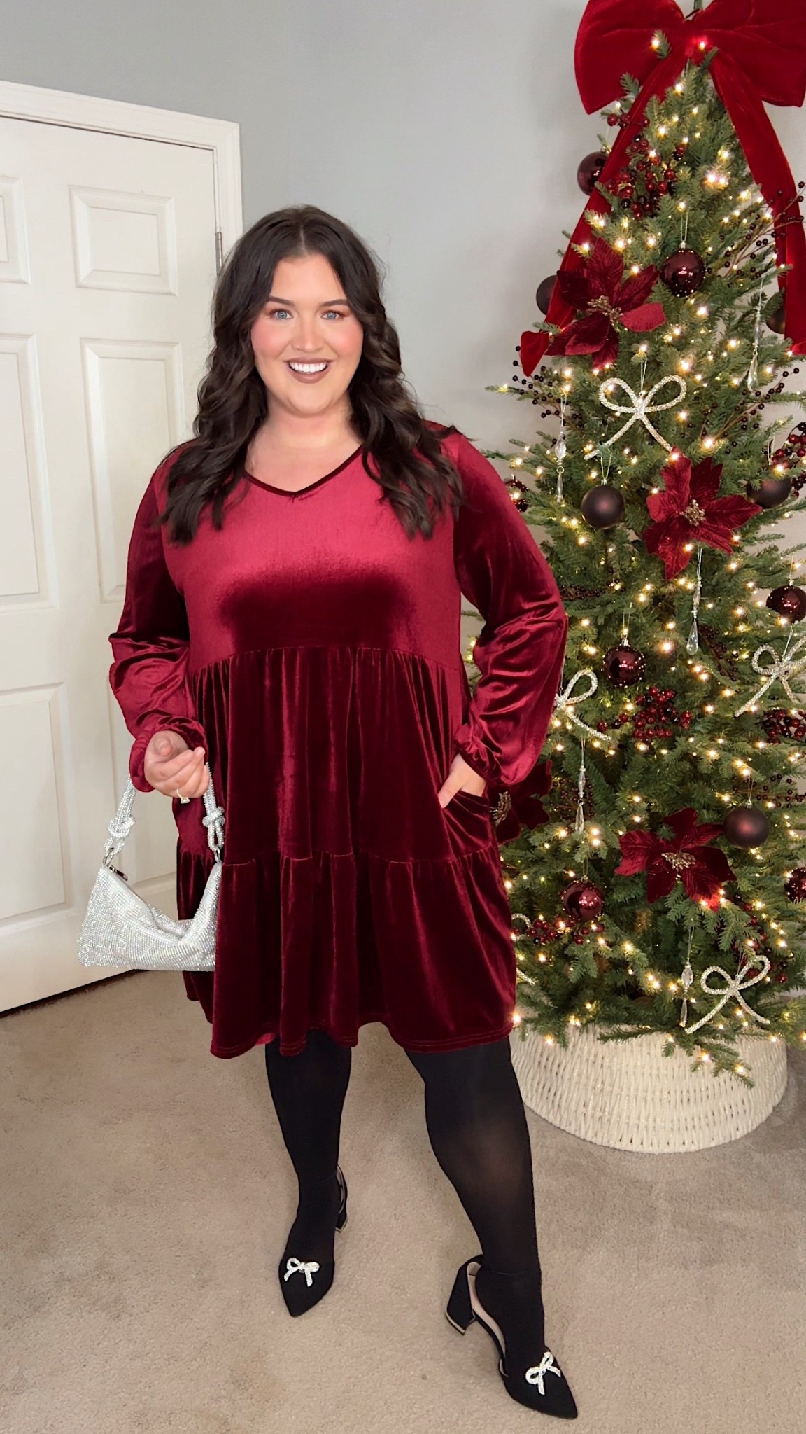 Amazon long sleeve velvet mini dress ❤️🎁🍷 Gorgeous wine red shade. Flowy fit with pockets! Wearing a size XXL. Accessorized with rhinestone clutch, closed toe black heels w/ clip on rhinestone bows for only $7! Paired with Coach gold perfume for a perfect seasonal scent ✨ Great for a holiday party or Christmas Day! 

#LTKPlusSize #LTKHoliday #LTKootd