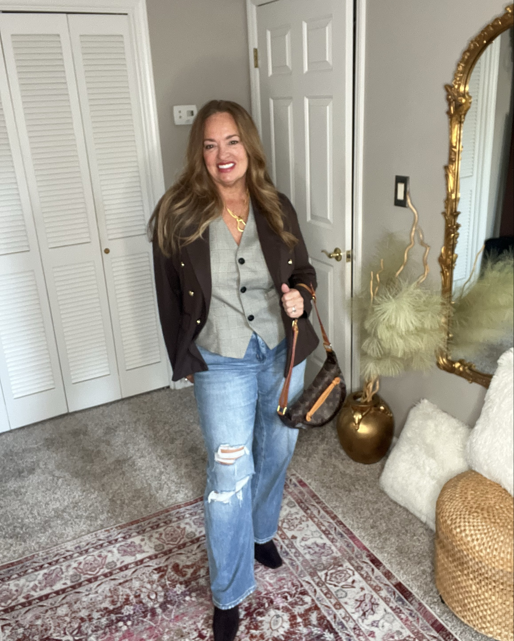 Cocoa brown and medium wash denim.. suede boots and plaid vest. Elevated casual. 

#LTKSeasonal #LTKMidsize #LTKFindsUnder50