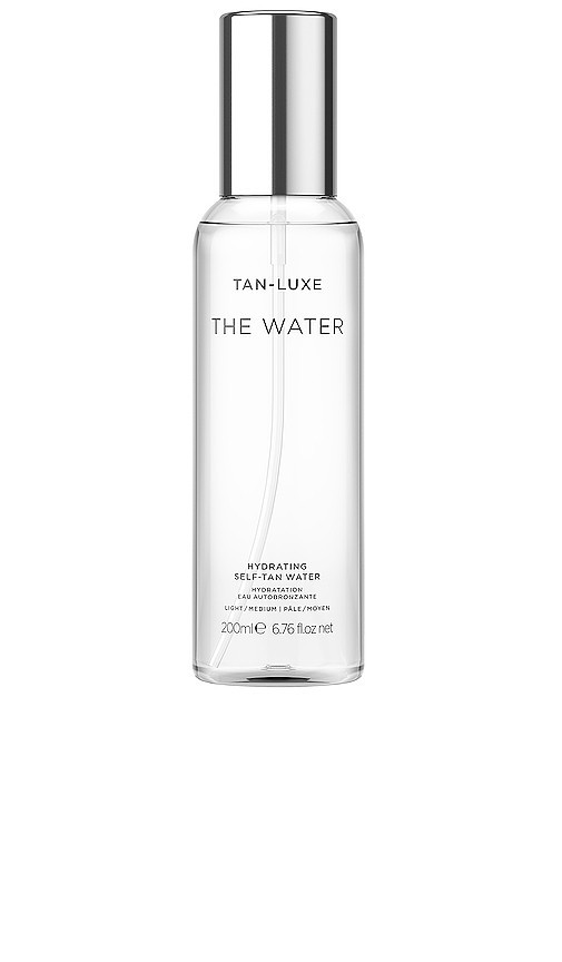 Tan Luxe The Water Hydrating Self-Tan Water in Light / Medium. | Revolve Clothing (Global)