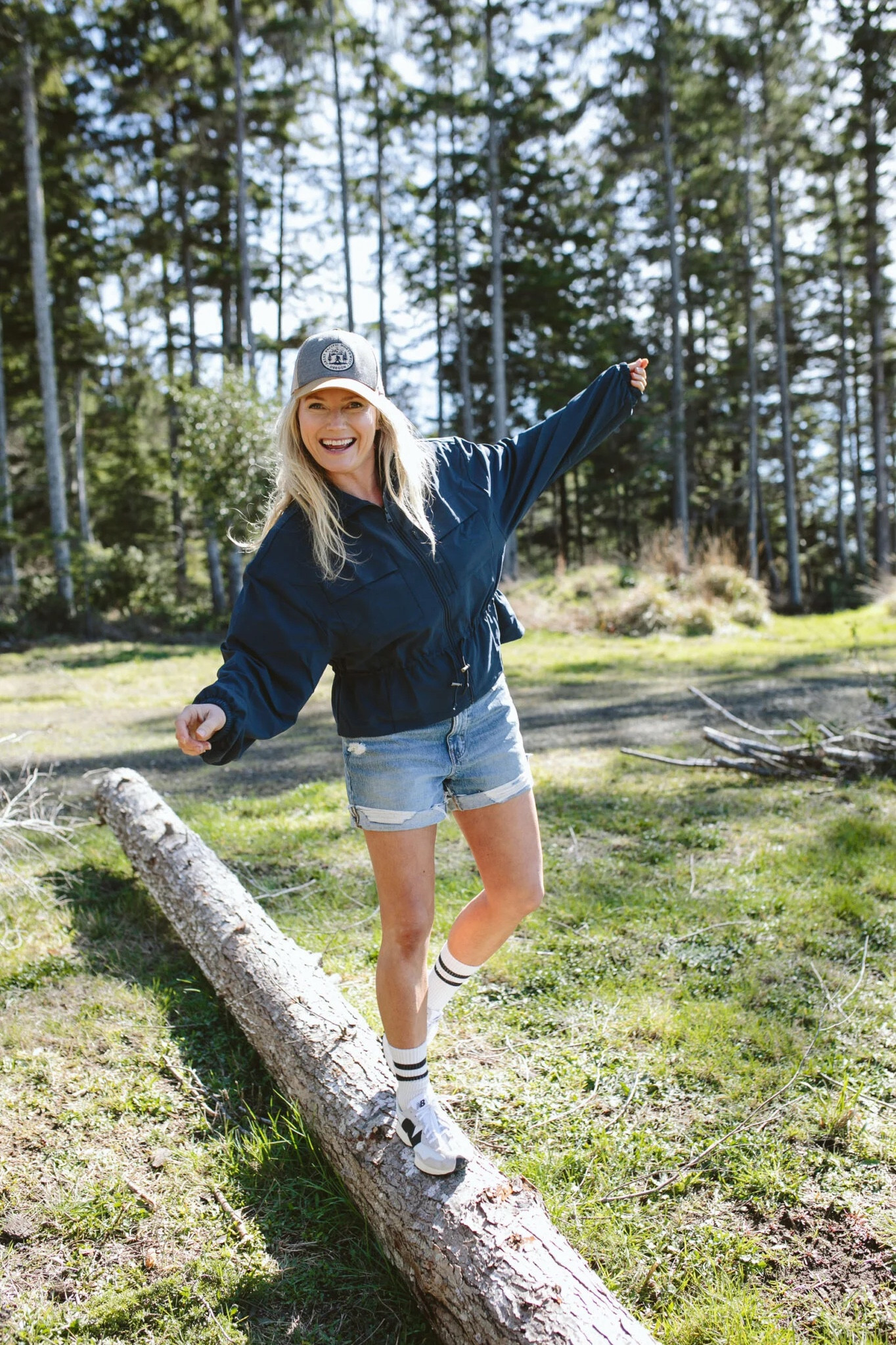 This one is nice and roomy in the pits (just how I like them) so that it can be thrown over and layer well. It’s my new favorite. It has multiple pockets that close (stop it with the side pockets where things fall out easily) and a little gather to break up the boxiness. Here I’m modeling last year’s Madewell shorts (these are oversized and I roll them up) with some cute 70s-inspired Bombas and my new strangely flattering New Balances (the shape of the shoe when you look down is legit very cute).

#LTKstyletip #LTKSeasonal #LTKshoecrush