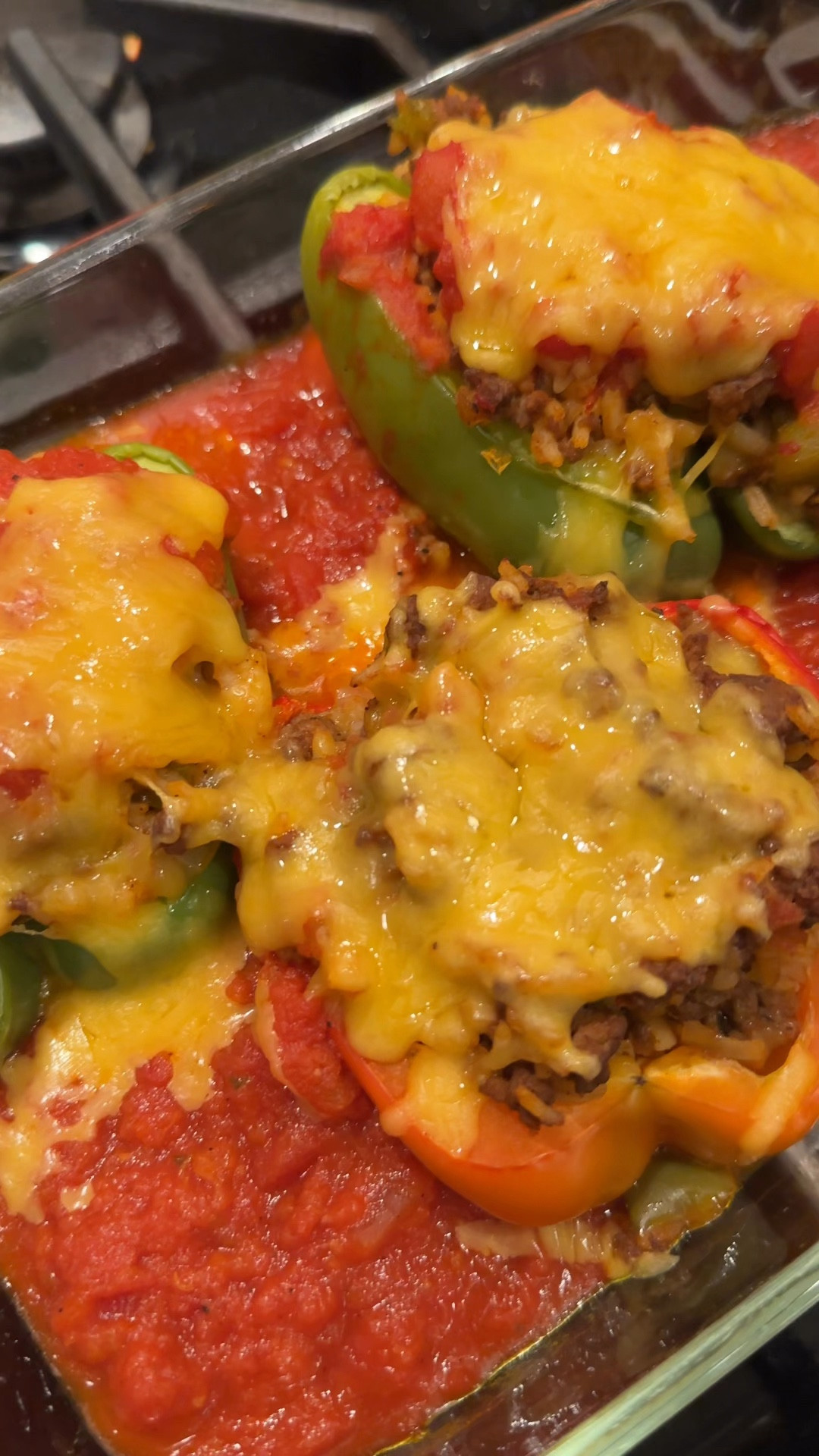 Stuffed Peppers

1 lb lean ground beef
1 medium onion, diced
3 green peppers, one diced, one cut in half
2 red pepper, cut in half, seeds and top removed
2 cloves garlic, finely chopped
1 15 oz jar of marinara sauce
2 cups of cooked white rice (save time and use 5 minute instant rice)
Olive oil
Cheddar cheese

Preheat oven
1. Begin by preparing the peppers to be used (cut two peppers lengthwise, scoop out the seeds and any membrane). Dice the remaining green pepper.
2. Chop onions and garlic, set aside.
3. Prepare the white rice, set aside
3. To a skillet add olive oil, onions and the green pepper. Cook until softened (about 5 minutes). 
4. Add the ground beef to the skillet, break apart and cook until browned. 
5. Once the meat has fully cooked, add in the garlic and stir until fragrant. 
6. To the pan, add in half the jar of sauce along with the 2 cups of rice. Stir until combined. Set aside.
7. Rinse the peppers with water to remove any seeds, add to a baking dish and bake for 15 minutes until tender. 
8. Remove from the oven, fill the pepper halves with meat and rice filing. Pour sauce over the tops of each pepper and into the bottom of the dish. Bake for 15 minutes. Remove, top with cheese and bake until the cheese has melted and the sauce is bubbling (about 15-20 minutes).


#LTKFamily #LTKHome #LTKVideo