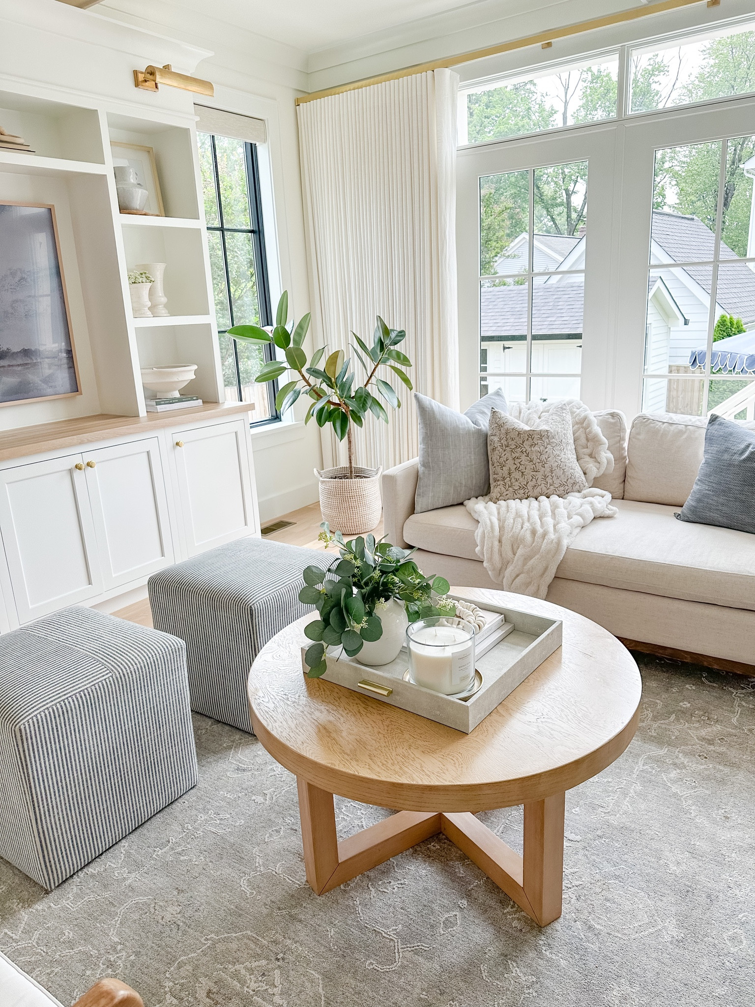 Still in stock! Our white oak look round coffee table - under $250 and has held up great for our family! Living room, design, furniture, neutral gray rug, Target find, Amazon home finds 

#LTKFind #LTKsalealert #LTKhome